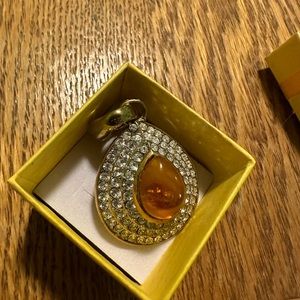 Gold tear drop pendant